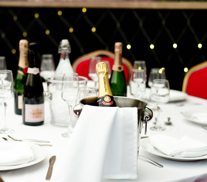 A table with bottles of champaign